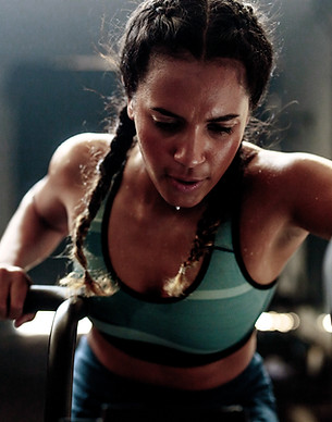 Woman Exercising Intently