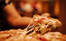 Eating pizza