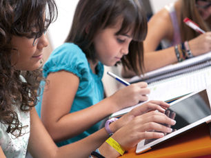 Students studying together in a classroom