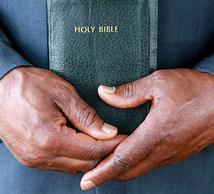Hands Holding Bible