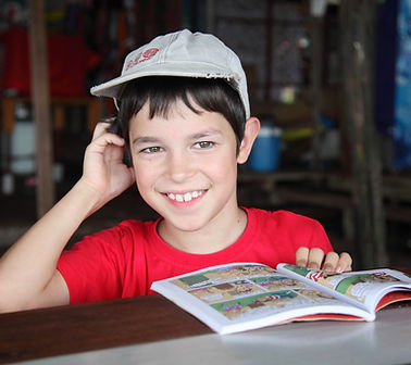 Child reading a comic book