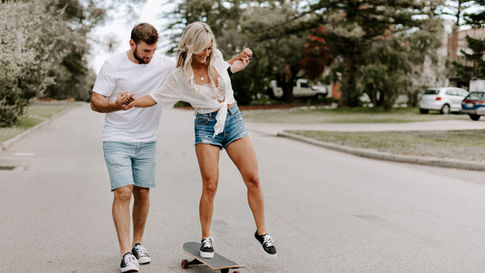 Happy couple skateboarding - Heart Connect Counselling - Branding and Identity for Therapists by Lola Wilder-Thorne