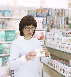 Woman shopping in pharmacy