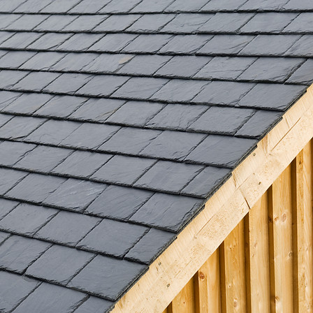 close-up image of black roof tiles