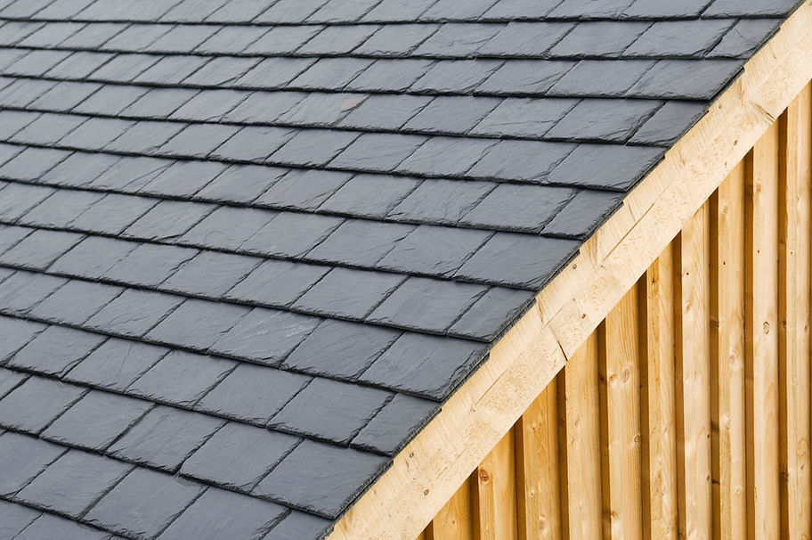close-up image of black roof tiles
