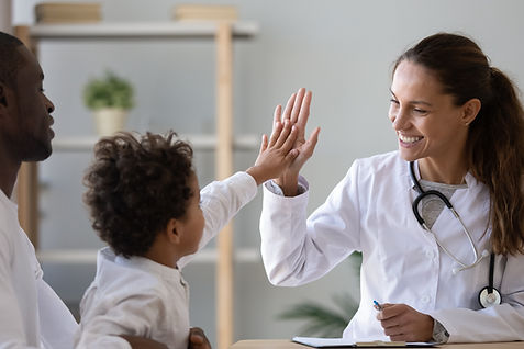 Doctor high-fiving child
