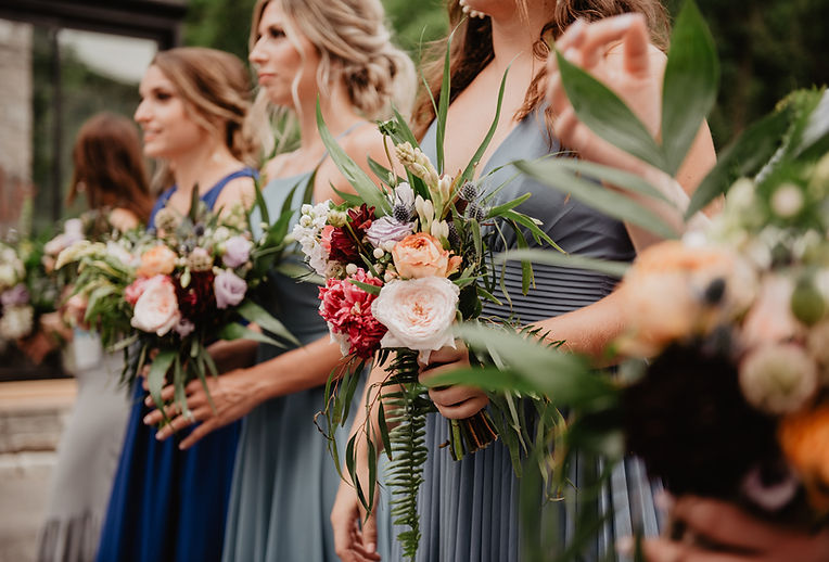 Bridesmaids holding bouquets