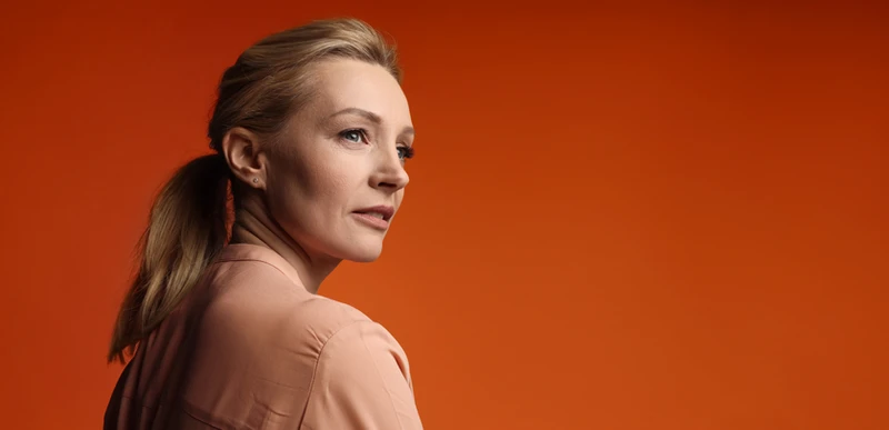 Portrait of a woman with arms crossed