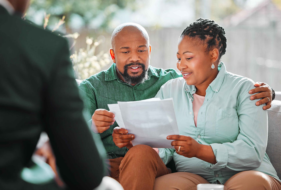 Couple Reviewing Documents