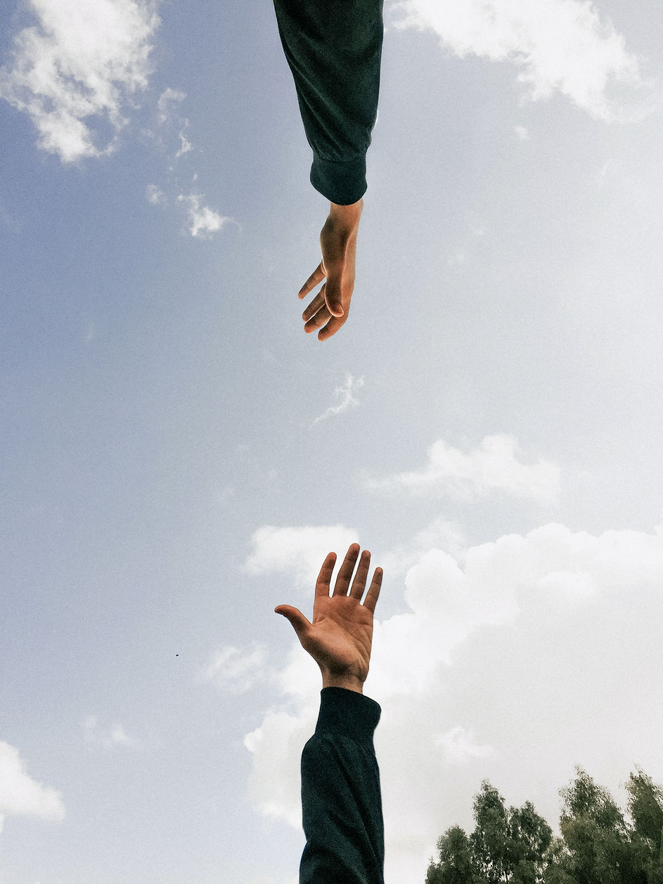 Two Reaching Hands