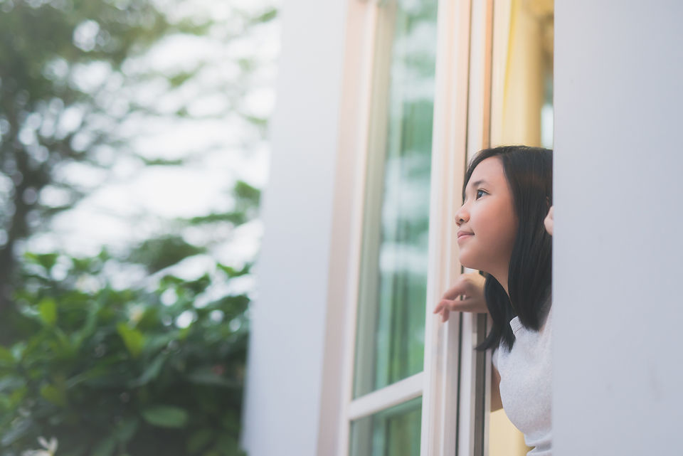 Person Looking Out Window