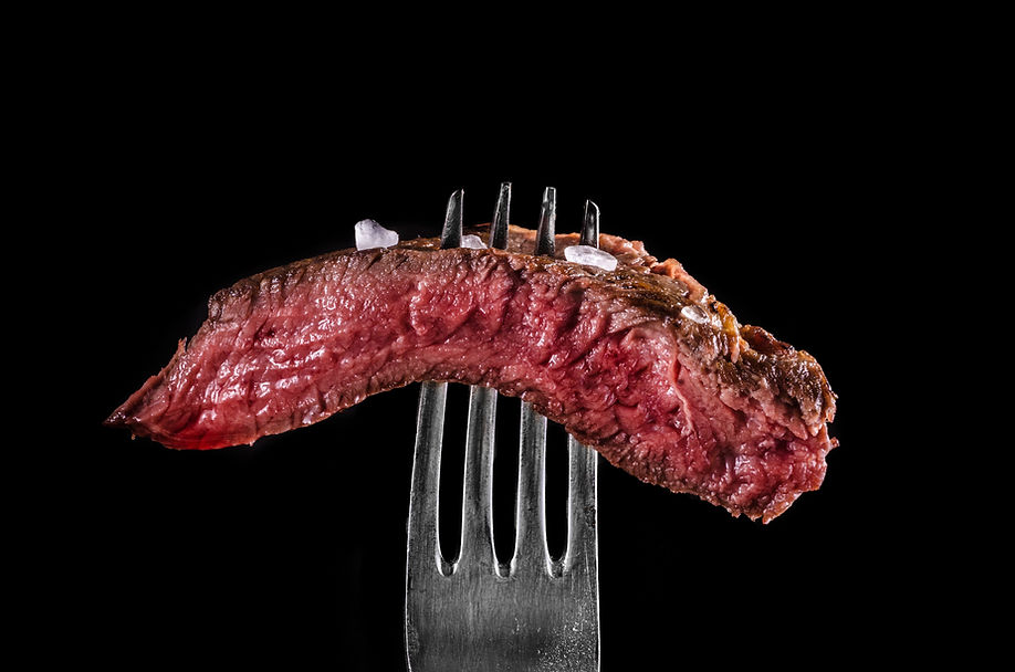 Steak On Fork