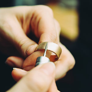 Goldsmith working on wedding rings