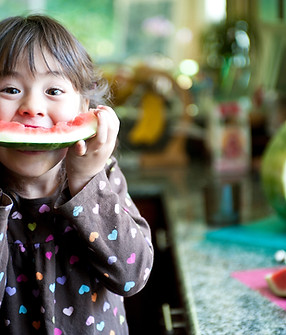 Child Eating Watermelon