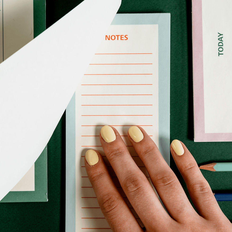 Hand on Notebook