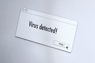 Virus warning on computer screen