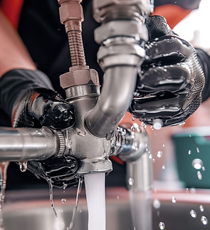 Plumber Fixing Sink