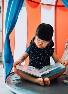 Child Reading Book