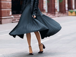woman twirling in her skirt : femininity