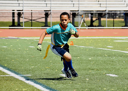 Youth Playing Football