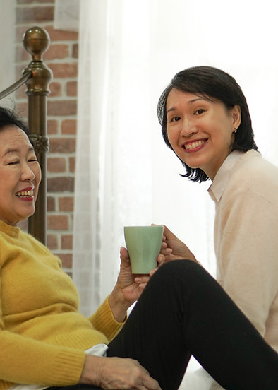 Mom and Daughter Smiling Together
