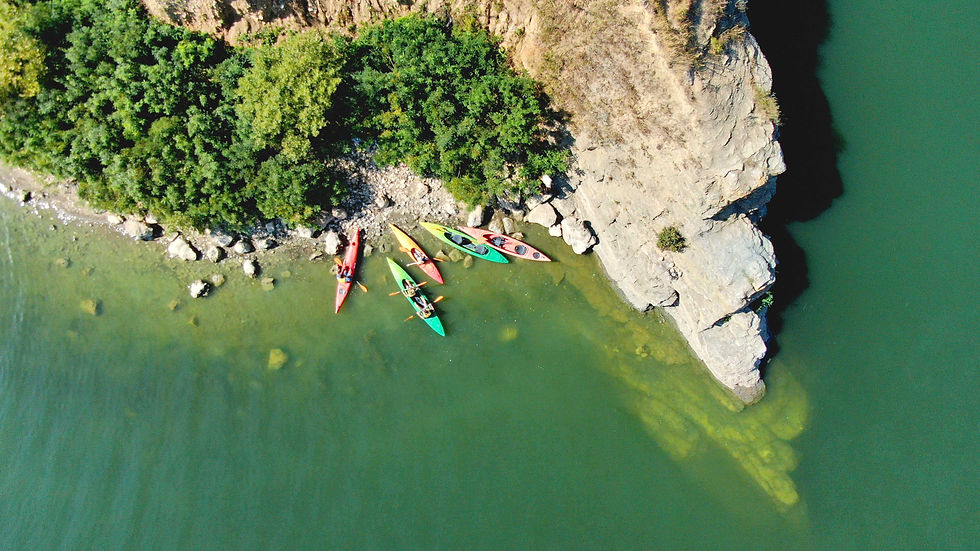 Kayaks by Cliffs