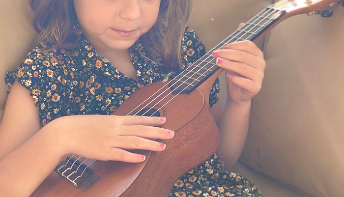Girl Playing Ukulele