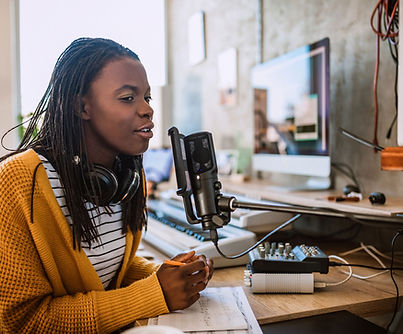 A young woman talking on the radio