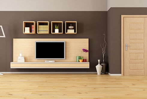A minimalist living room with well-organized cabinet shelves and a sleek LED TV, creating a modern and tidy interior