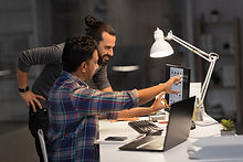Colleagues Looking at the Same Screen