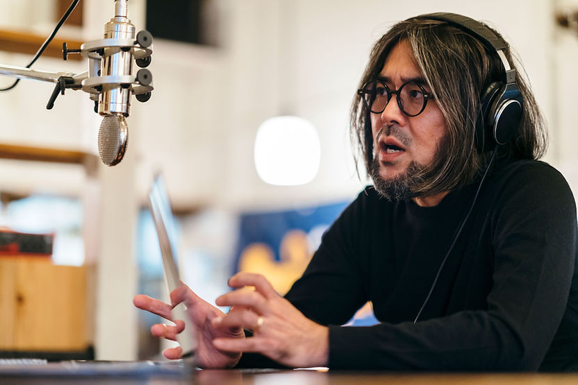 A man talking on the radio