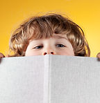 Child Behind Book