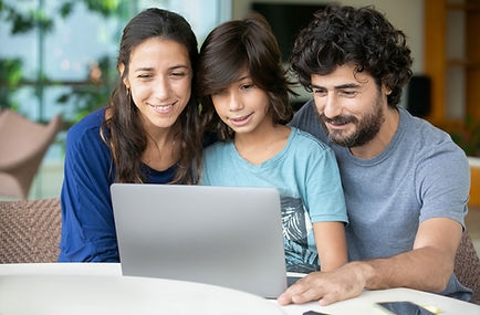Family Using Laptop