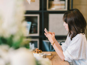 woman distracted on phone but wants to do something more helpful