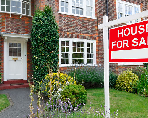 House with a for sale sign ready for a pre-listing clean