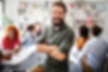 Small business owner happy with the strategies to improve business performance with Sparkverse's small business consulting services