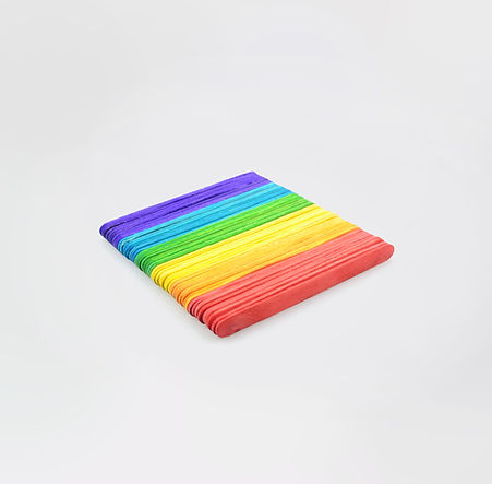 Blue, green, yellow and red beads in rows making a square sit on a white background