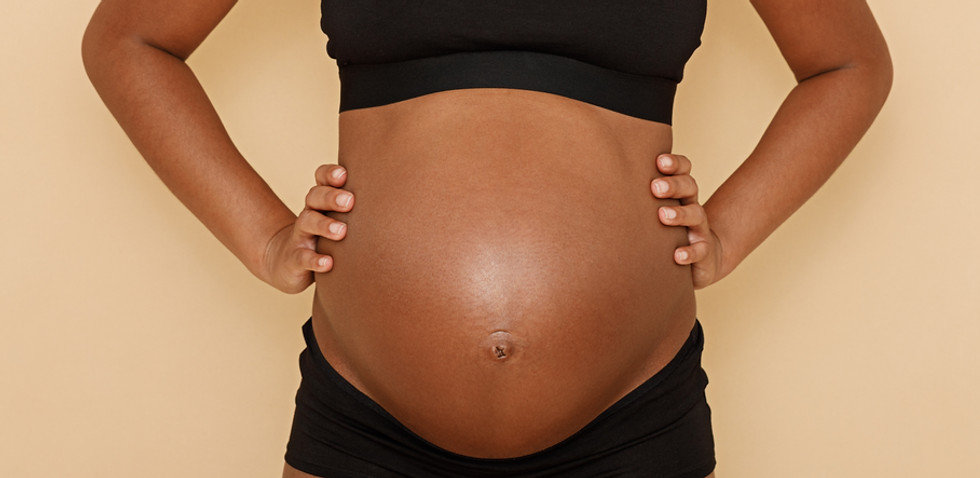 Pregnant Woman in Underwear