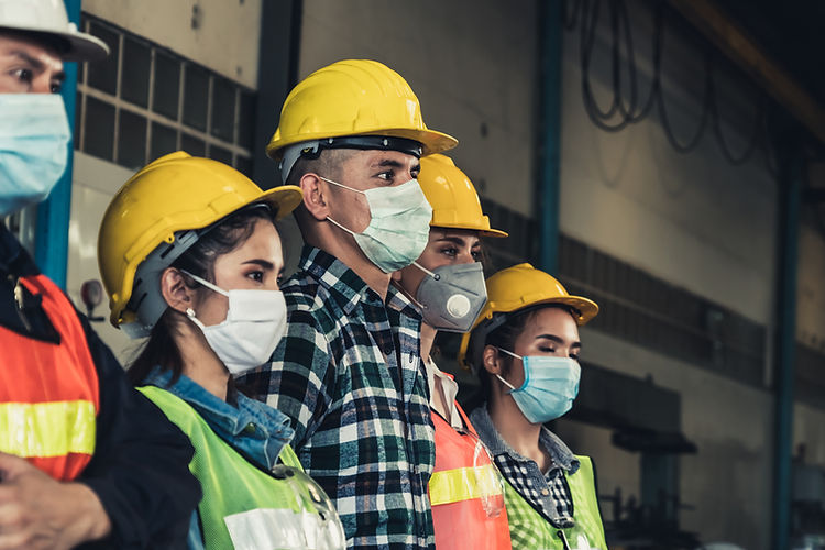 Industrial workers with masks