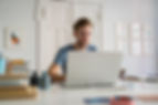 man word processing a legal document on a computer or doing legal transcription - what word processing