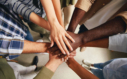 Group of diverse hands symbolizing we are all in