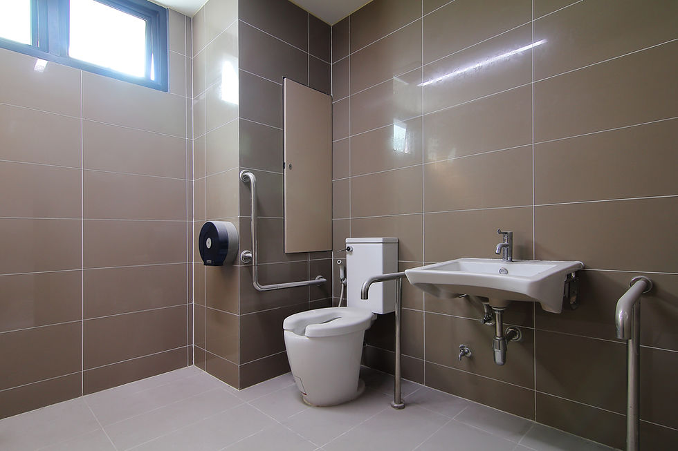 Accessible bathroom with grab rails, tiled wet area and wall-mounted basin