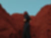 Woman in Rocky Scenery