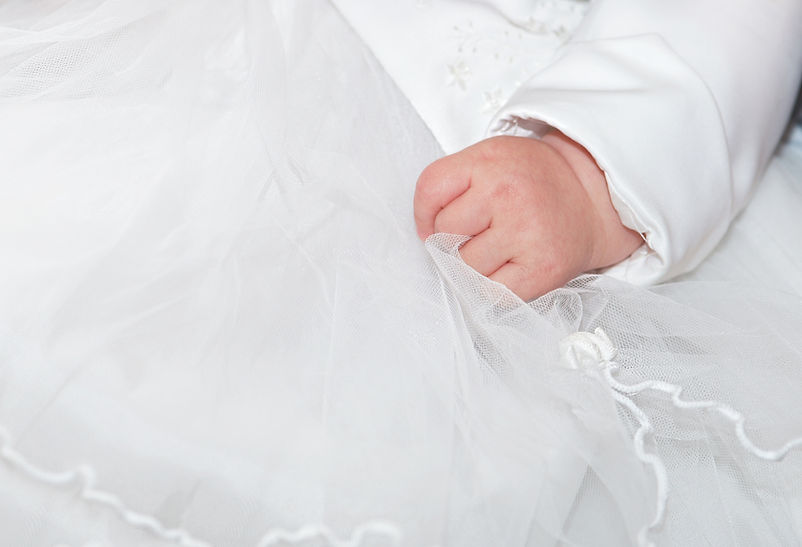 Baby hand on fabric