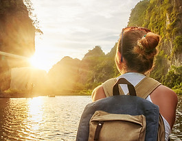 Woman Kayaking at Sunset