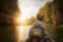 Woman Kayaking at Sunset