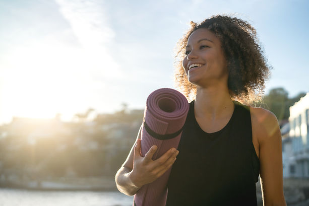 Woman with Pilates Mat