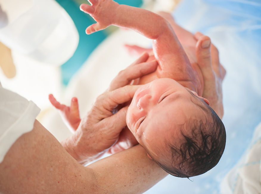 Baby Held Gently