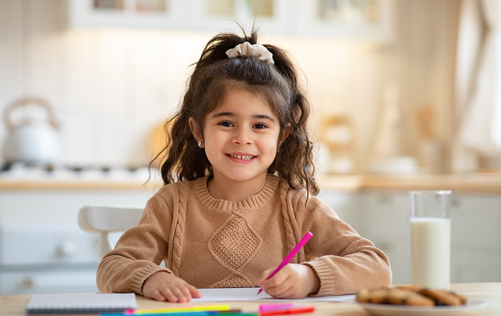 Smiling Girl Drawing