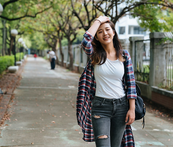Person Walking Along the Street